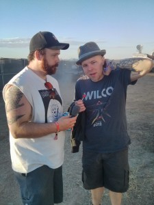Kris Roe getting harassed by a filthy homeless bum in the dirt pit that was Backstage Riot Fest Denver!